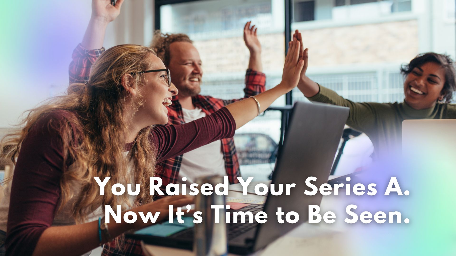 a team of startup founders celebrate their success